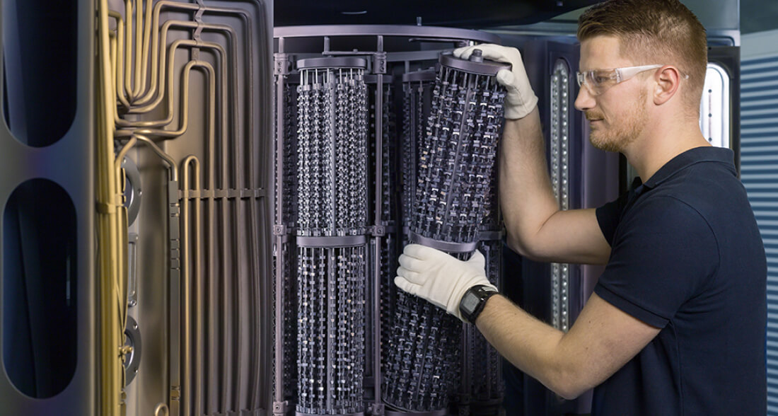 Man operating a coating system in the coating center in Würselen